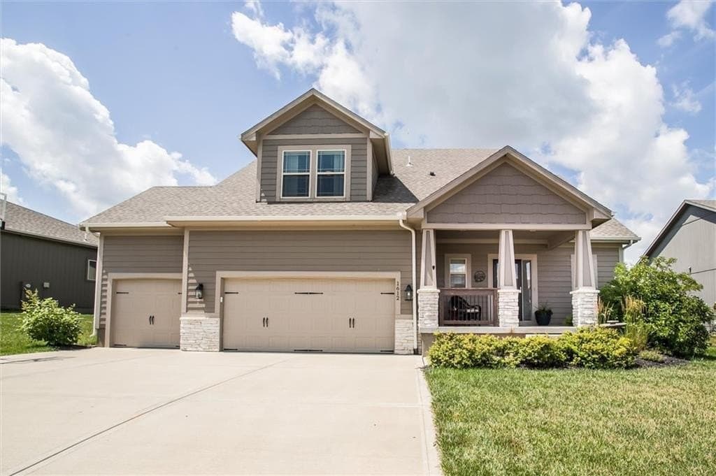 4 bedroom house for sale at 1612 March Ln Raymore 64083 - $495,000