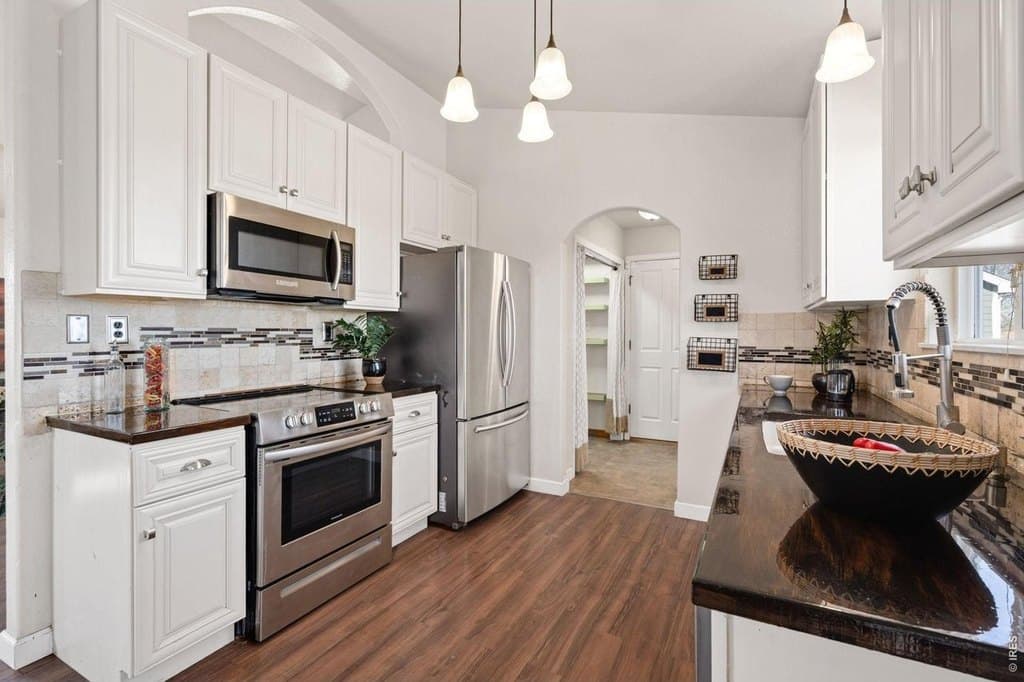 4 bedroom house for sale at 3208 Iron Horse Way Wellington 80549 - $447,200