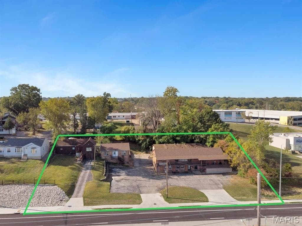 12 bedroom multi-family for sale at 8950 Natural Bridge Rd Bel-Ridge - $379,000