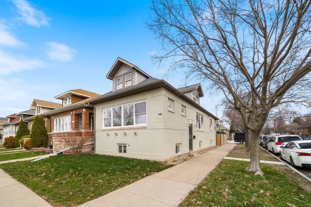 6 bedroom multi-family for sale at 5700 W Melrose St Chicago - $599,900
