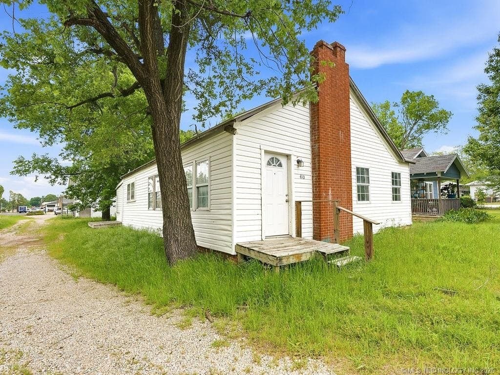 5 bedroom duplex triplex for sale at 410 E 13th St Ada - $78,000