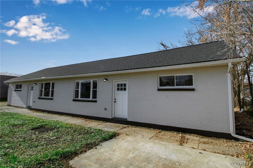 4 bedroom multi-family for sale at 24 Commercial St Blasdell - $199,900